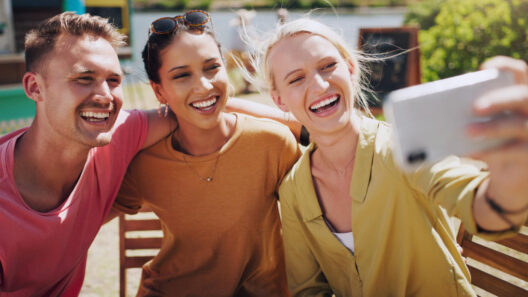 girl takes selfie with friends