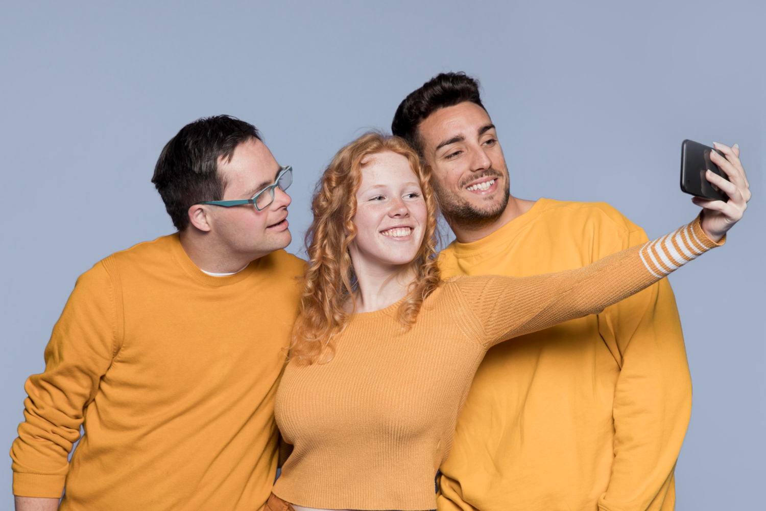 girl takes selfie with friends